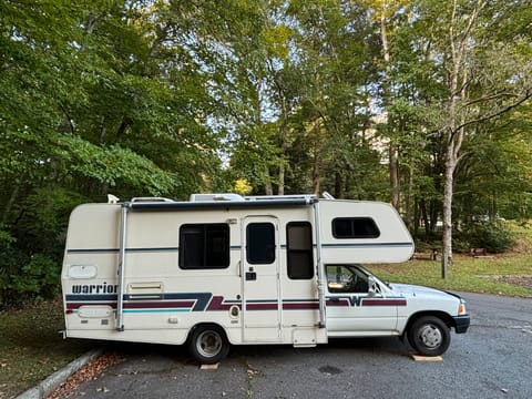 Includes awning and outdoor shower. All windows have screens.