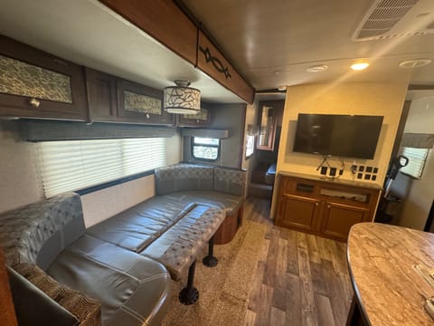 Dinette converted to large bed.