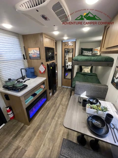 Galley Kitchen includes a Fridge, Freezer, Air Fryer, Microwave, and Convection Oven, tons of storage for your food, counterspace for meal prep, a 12-Cup Coffee Maker, a 2-Slice Toaster...and the kitchen sink for prep and cleanup.  