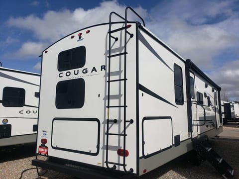 Cougar Den III Towable trailer in Opelika