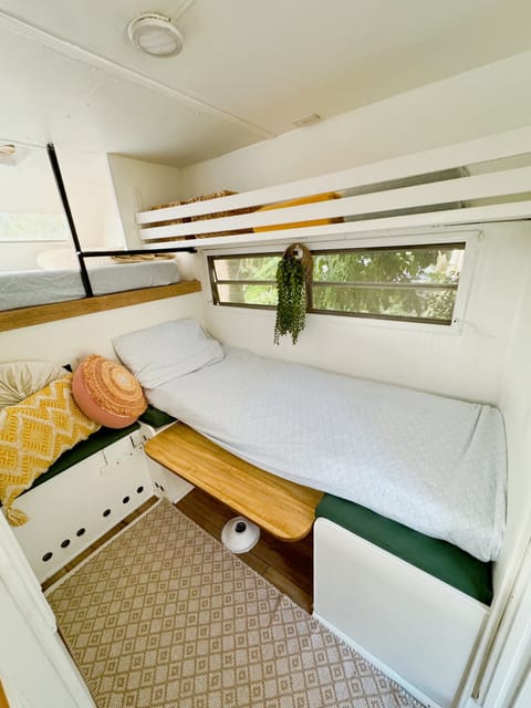 The dinette converts to a single bed.