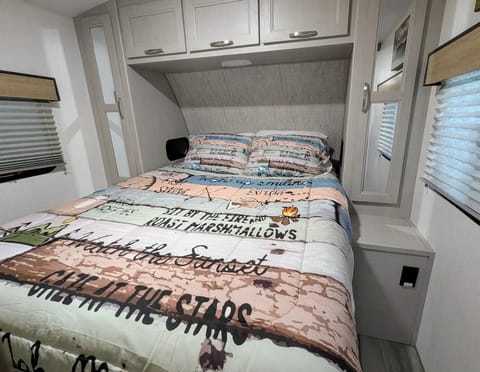 Private Queen bed with storage.