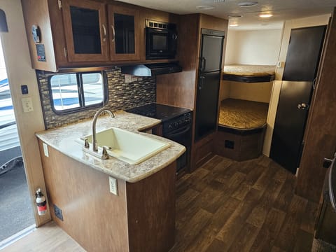 Kitchen and ear bunk area