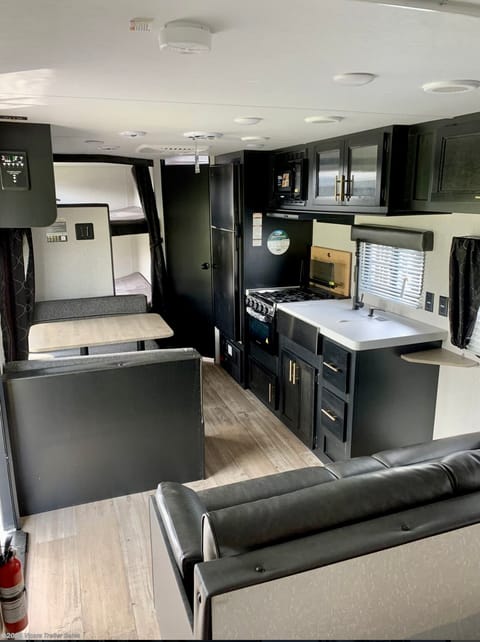 Kitchen, dinette, fridge, bathroom door