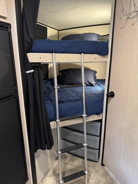 Full over Full bunk beds with foam toppers (angled entrance).  Comfortably sleep 2 small children in one bed or 1 older child/adult.  300 pound weight limit each bed.