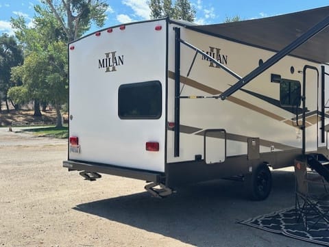 There are two storage compartments in the front of the RV, and an exterior fridge for keeping the drinks cold.
