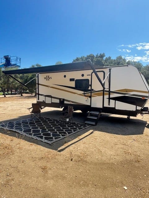  This 2024 Eclipse Milan Series 24RKS is outfitted with all the features you need for happy camping.  Setup is a breeze thanks to one roomy slide. The awning with LED lights is a nice extra feature for added ambiance at night.
