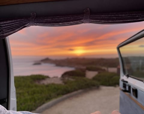 The back door opens full width for views right from the main sleeping area. This picture was take at Bean Hollow Beach on Highway 1.