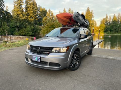 Lakeside shot from a personal outing. The vehicle includes full setups for your kayaks, canoe, or mountain bikes, so you can load up and go.