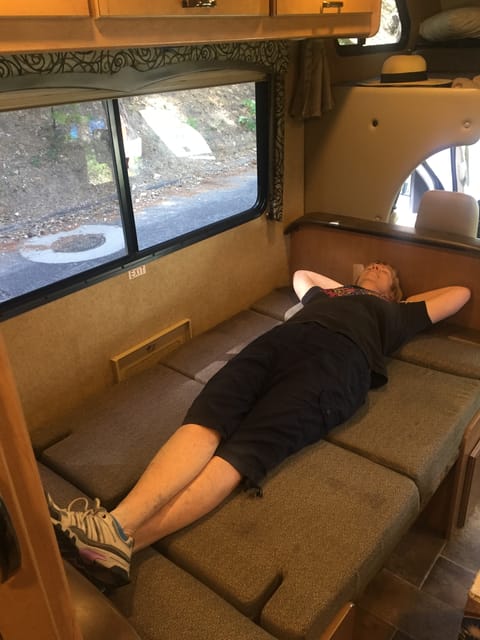 I (Diane) am 5'6".  I can stretch all the way out on the dinette bed, but that's about the maximum height to be comfortable in this sleeping space.