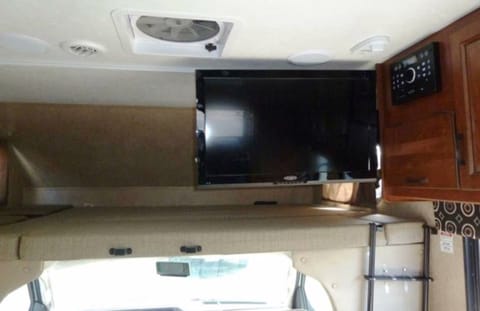 Extra Large Flat Screen with TV/DVD combo & stereo. Queen sized bed over cab with privacy curtain!