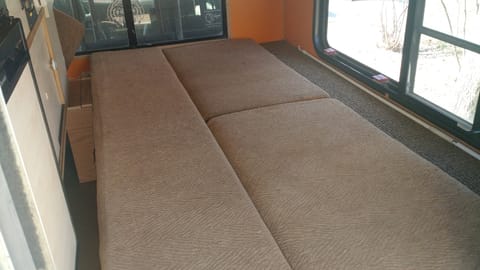 Rollover couch made into a bed.  Otherwise it just stays as a couch.