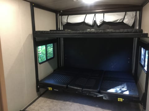 Garage with retractable queen beds inside dimensions 8’x12.5’ 2k lb capacity 