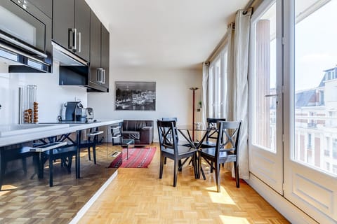 Parquet & Leather Apartment in Paris