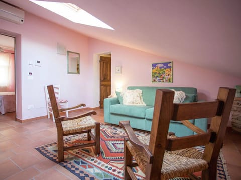 A Pop of Pink Apartment in Umbria
