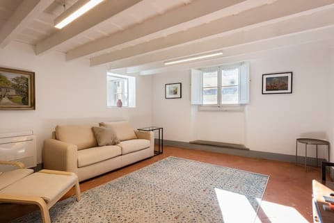 Terracotta & White Wood Apartment in Florence