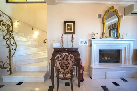 Sea Through the Grecian Columns Apartment in Crete