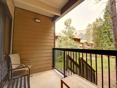 The balcony offers great wooded views and ski access from the stairs.