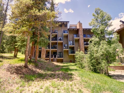 East side of building with views of trees.