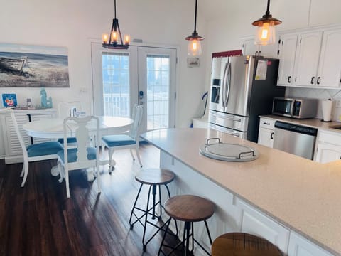 Streetside Deck Door to Dining Area and Kitchen