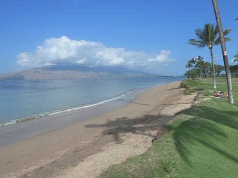 Waipuilani Beach fronting Maui Sunset complex, West Maui in the background, view north