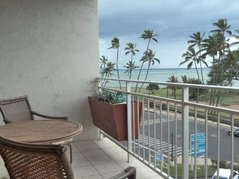 Balcony, view south; ocean view and beach park across the street