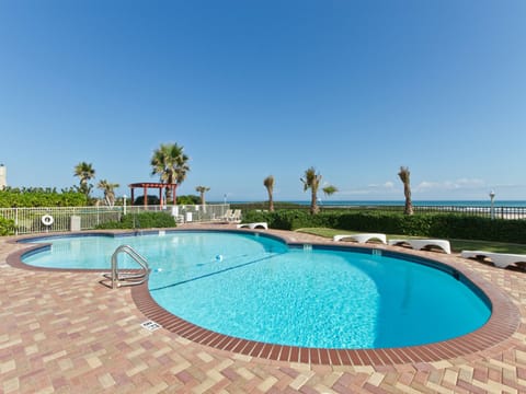 Shared community pool facing the beach! Heated in the winter.