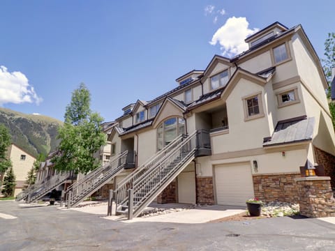 Elk Run entrance through garage or stairways to front doors.