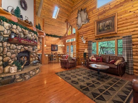 Creekside Retreat   - The beautiful wood burning stone fireplace adds character and charm!