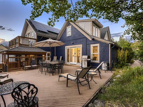 A gorgeous, spacious back deck for the whole family to relax on!
