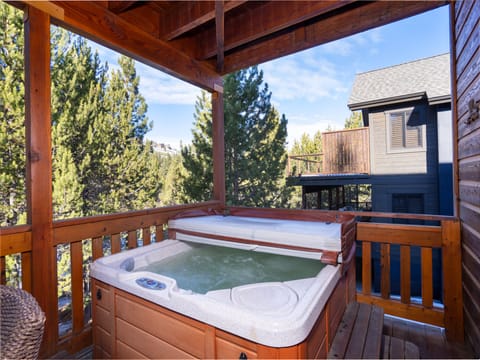 Unwind in the steaming hot tub year-round, conveniently located just off the family room on the lower deck!