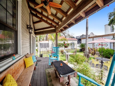 Covered porch facing the shared yard