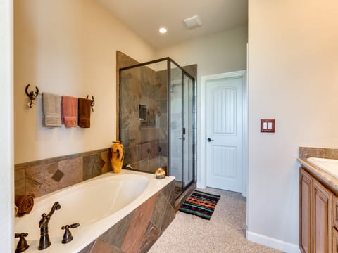 Ensuite master bath with double sinks, a shower and tub!