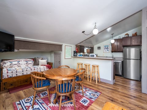 Open floor plan, with kitchen feeding into living/dining area.