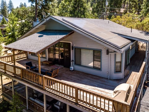 Deck and front of house. ("Respite" - Unit 8 Lot 228 Vacation Rental)