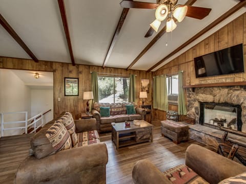 Living room area and front entry. Unit 13 Lot 351 Vacation Rental (Grizzly Blair Lodge)