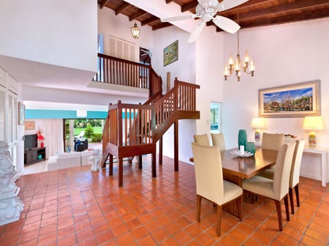 The entry foyer leading to an open living and dining area