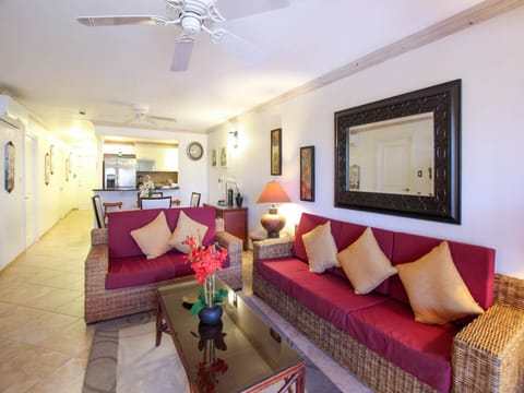 Open plan living area kept cool by ceiling fans