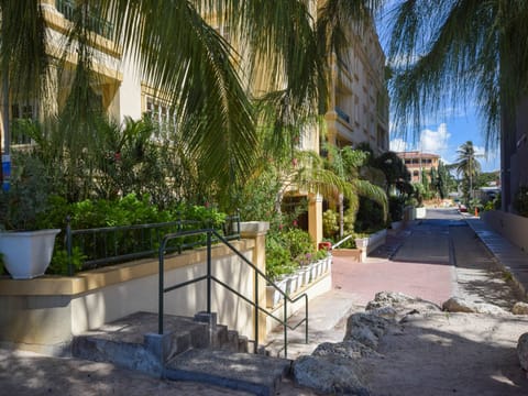 The entrance to the beach with Terraces in the background at the end of the gap