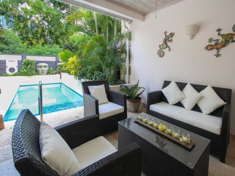 Comfortable lounge area overlooking the pool