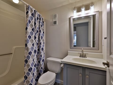 Full bathroom with combo tub/shower