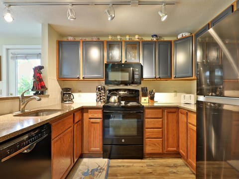 Fully equipped kitchen with granite countertops