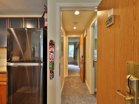 View of hallway to lock off unit with two twin size beds