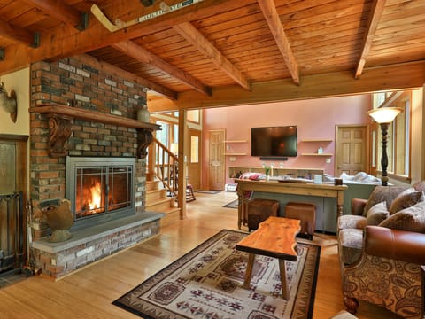 Cozy sitting area with wood burning fireplace