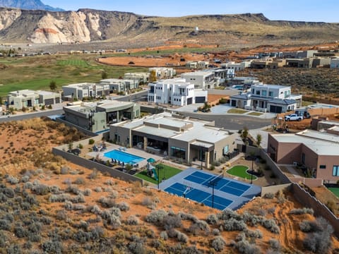 From this angle you can see the backyard and all the fun amenities available to you as well as the mountains and natural desert landscape.