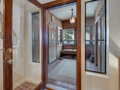 Entry of this Amazing home invites you to a Large Mud Room to leave wet clothes....