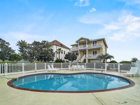 3-5ft. depth with ascending stairs and poolside dining area and loungers