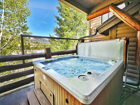 Bubbling hot tub with mountain views