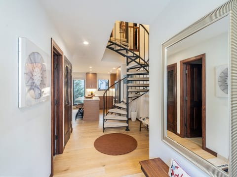 The foyer offers a coat closet and ample space for keeping shoes out of the way and getting ready to head out for the day.