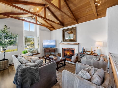 Living Room has a Gas Fireplace and TV